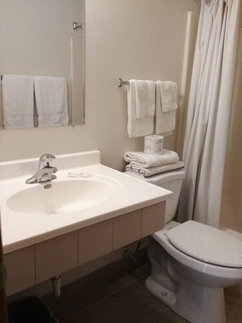 Room, 2 Queen Beds | Bathroom | Towels, soap, toilet paper