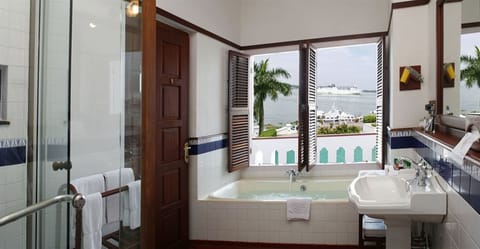 Sea Facing Room | Bathroom | Free toiletries, hair dryer, bathrobes, towels