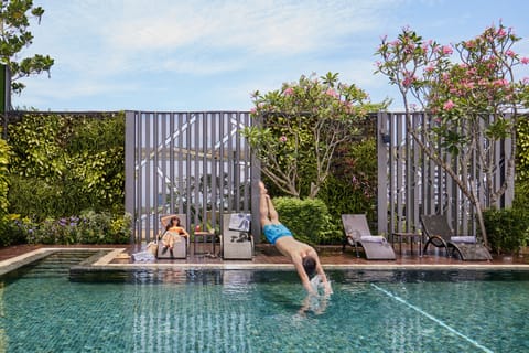 Outdoor pool, pool umbrellas, sun loungers