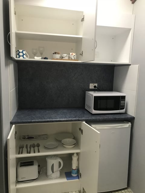 Fridge, microwave, coffee/tea maker, electric kettle