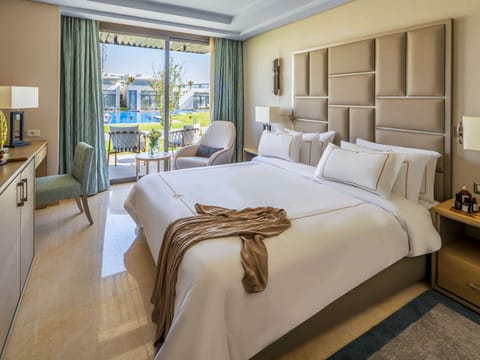 Villa, 2 Twin Beds, Poolside | Free minibar, in-room safe, desk, blackout drapes