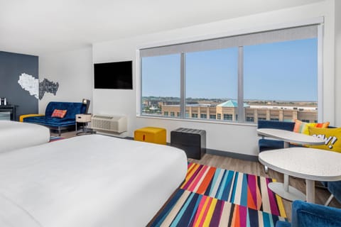 Breezy, Suite, 1 Bedroom | Minibar, in-room safe, desk, laptop workspace