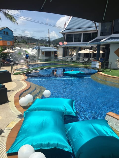 Outdoor pool, pool umbrellas, sun loungers