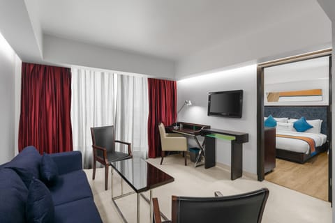 Junior Suite, 1 King Bed | Premium bedding, minibar, in-room safe, individually decorated