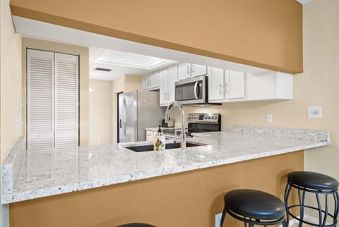 Condo, Multiple Beds, Garden View | Private kitchen | Fridge, microwave, oven, stovetop