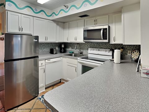 Condo, Multiple Beds, Beach View (#403 - No Pets Allowed) | Private kitchen | Full-size fridge, microwave, oven, stovetop