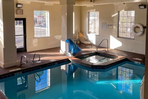 Indoor pool, open 7:00 AM to 10:00 PM, sun loungers