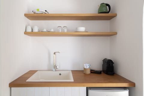 Junior Suite | Private kitchen | Espresso maker, coffee/tea maker, electric kettle