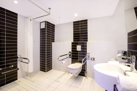 Standard Room, 1 Double Bed, Accessible | Bathroom | Rainfall showerhead, hair dryer, towels, soap