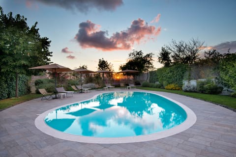 Seasonal outdoor pool, pool umbrellas, sun loungers