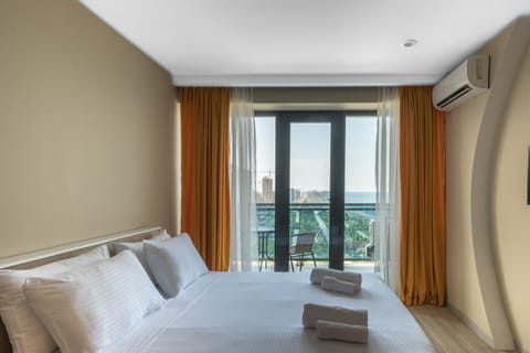 Superior Double Room, Sea View | Blackout drapes, soundproofing, iron/ironing board, bed sheets