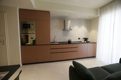 Standard Suite, 1 Bedroom, Sea View (Suite Season) | Private kitchen | Eco-friendly cleaning products