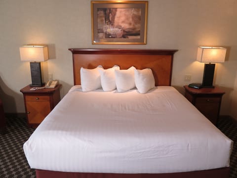 Premium bedding, down comforters, pillowtop beds, in-room safe