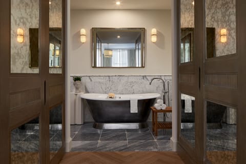 Otto Suite | Bathroom | Designer toiletries, hair dryer, bathrobes, slippers