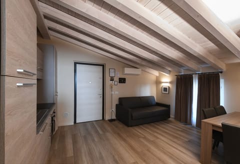 Apartment (4 Adults Apt 26) | Living area | 32-inch flat-screen TV with cable channels, TV