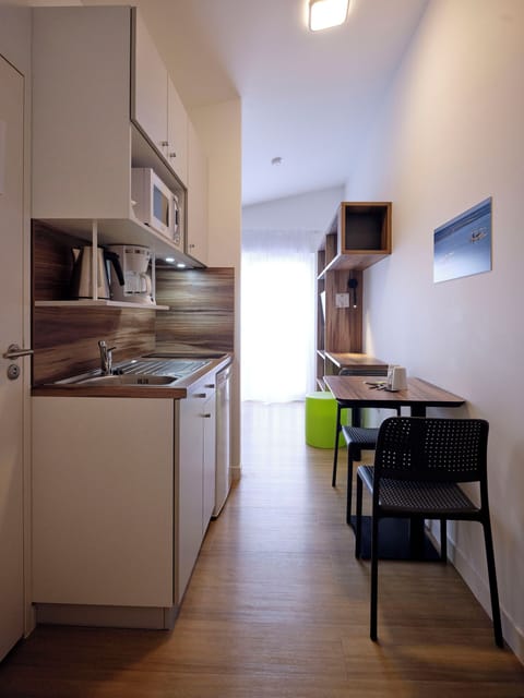 Classic Studio | Private kitchen | Mini-fridge, microwave, stovetop, coffee/tea maker