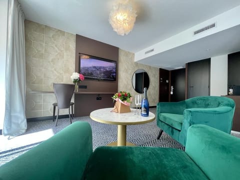 Suite, 1 King Bed | Premium bedding, free minibar, in-room safe, individually decorated