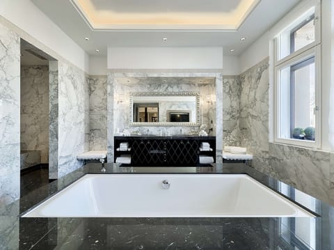 Presidential Suite | Bathroom | Separate tub and shower, deep soaking tub, rainfall showerhead