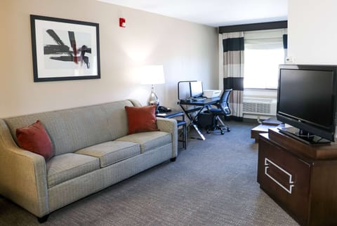 Suite, 1 King Bed, Non Smoking (1 Bedroom) | Desk, iron/ironing board, free cribs/infant beds, rollaway beds