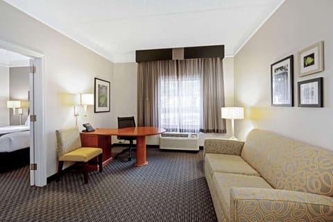 Suite, 1 King Bed, Non Smoking | Pillowtop beds, desk, blackout drapes, iron/ironing board