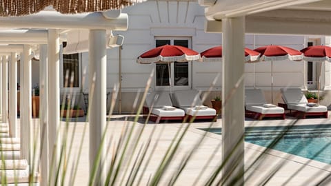 Outdoor pool, open 10:00 AM to 8:00 PM, pool umbrellas, sun loungers