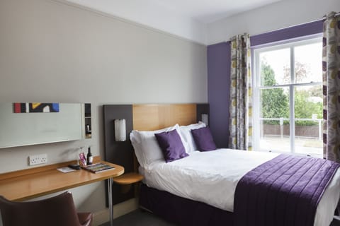 Standard Double Room | Minibar, blackout drapes, iron/ironing board, free WiFi