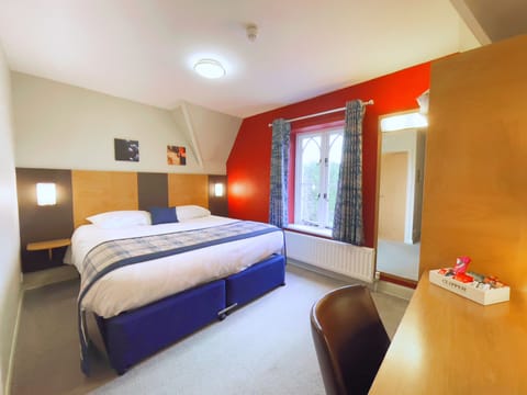 Standard Double Room | Minibar, blackout drapes, iron/ironing board, free WiFi