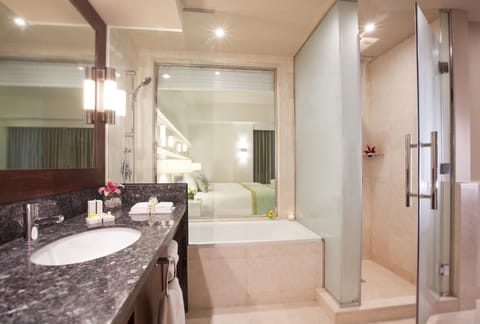 Junior Suite, Balcony, Sea View (Full Ain DubaiView-Coral LoungeAccess) | Bathroom | Combined shower/tub, deep soaking tub, eco-friendly toiletries