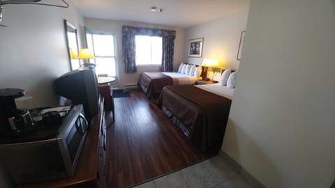 Basic Double Room, 2 Queen Beds | Minibar, individually decorated, individually furnished, desk