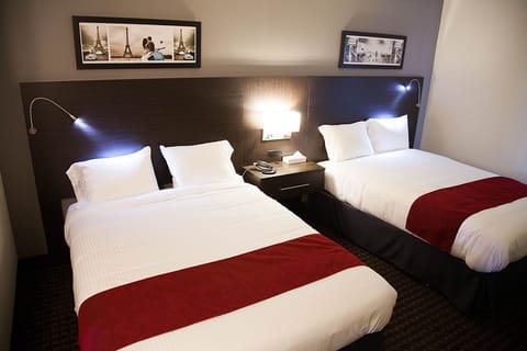 Standard Room, 2 Queen Beds | Blackout drapes, free WiFi, bed sheets