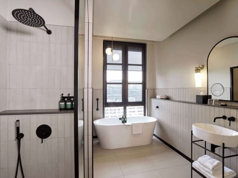 All Access King | Bathroom | Shower, rainfall showerhead, eco-friendly toiletries, hair dryer