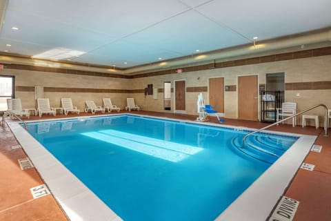 Indoor pool, open 9:00 AM to 10:00 PM, sun loungers