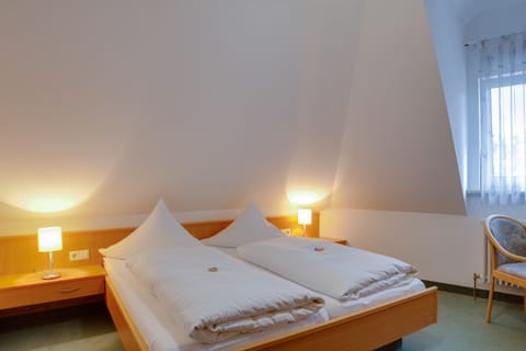 Standard Double Room | Premium bedding, in-room safe, laptop workspace, iron/ironing board