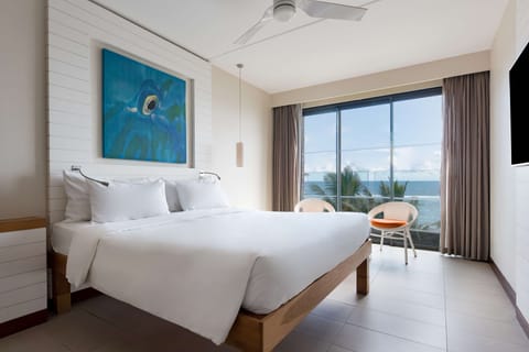 Superior Room, Beachfront | Minibar, in-room safe, desk, laptop workspace