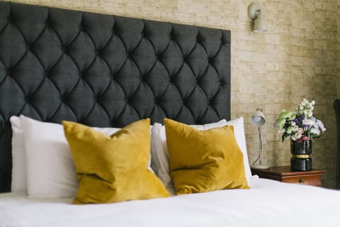 Executive Suite, 1 Bedroom | Individually decorated, desk, iron/ironing board, free WiFi