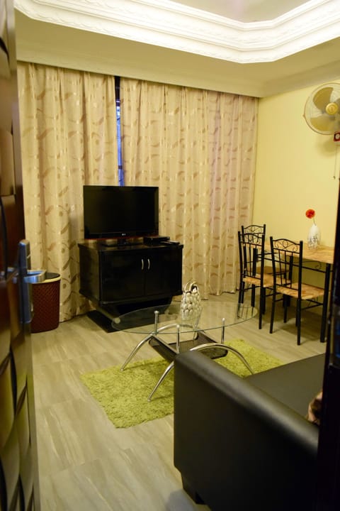 Apartment, 2 Bedrooms | Living area | 32-inch flat-screen TV with cable channels, TV