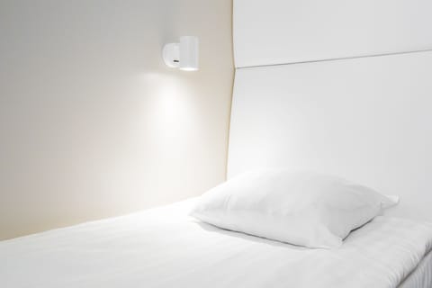 Single Room, 1 Twin Bed | Blackout drapes, soundproofing, free WiFi, bed sheets