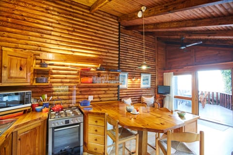 Waterfront Chalet | Private kitchen | Full-size fridge, microwave, oven, stovetop