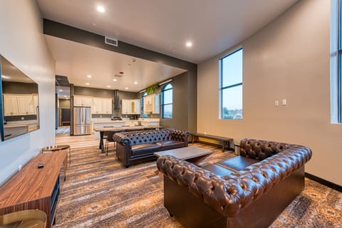 Heritage Penthouse | Living area | 49-inch LED TV with cable channels, TV, iPod dock