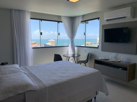 Deluxe Room, Ocean View | Minibar, desk, iron/ironing board, free WiFi