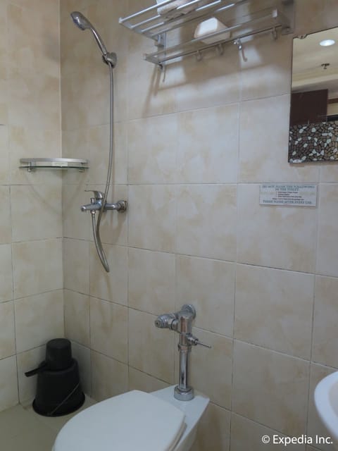 Double Standard | Bathroom | Shower, free toiletries, slippers, towels