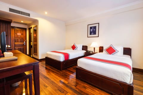 Deluxe Room, Pool View | Premium bedding, minibar, in-room safe, individually decorated