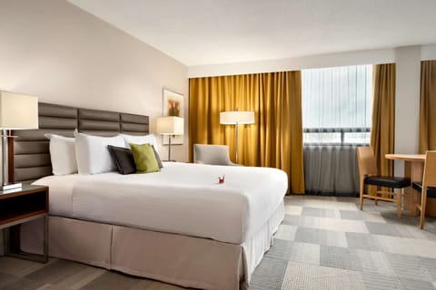 Junior Suite, 1 King Bed (Coast Premium King Junior Suite) | Premium bedding, down comforters, in-room safe, desk