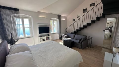 Luxury Suite, Terrace, Sea View | Hypo-allergenic bedding, in-room safe, individually decorated