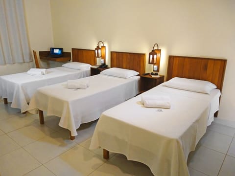 Comfort Triple Room, 3 Twin Beds | Minibar, individually furnished, desk, laptop workspace