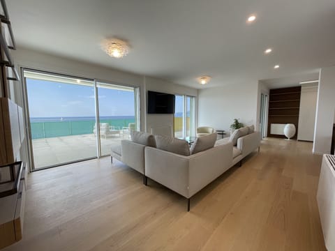 Presidential Penthouse | Living area | 55-inch LED TV with satellite channels, TV