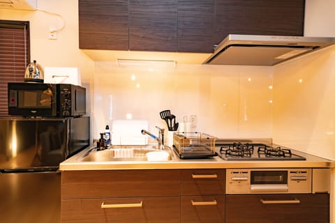 Premium Penthouse (2F) | Private kitchenette | Fridge, microwave, stovetop, electric kettle