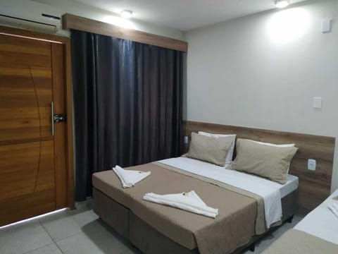 Standard Triple Room | Minibar, free WiFi, bed sheets