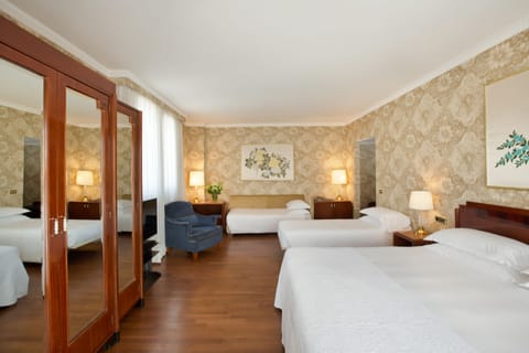 Family Room | Premium bedding, minibar, in-room safe, individually decorated