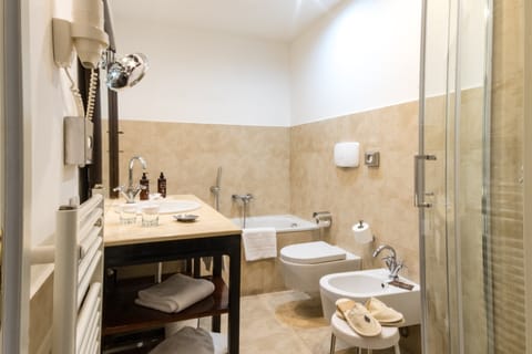 Panoramic Room, Partial Sea View | Bathroom | Combined shower/tub, hair dryer, bidet, towels